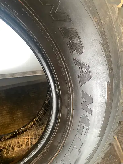Goodyear Wrangler All terrain 4 x LT275 R70 18, 1550 lb. Individual tire load rating. Tires were tak...