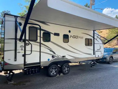 For sale I-Go Pro G235RB travel trailer by EverGreen features a u-dinette and a rear bath. Remote wi...