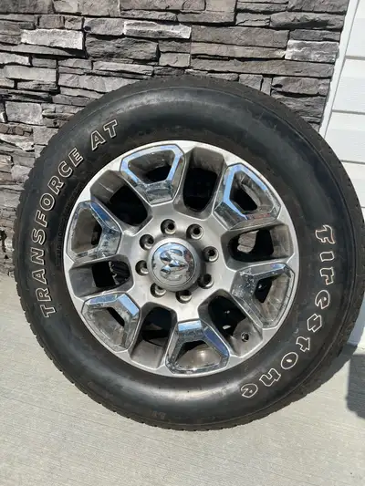 Stock wheels and tires from 2018 Ram 3500 Limited. Tires were used for approximately 10,000 km, lots...