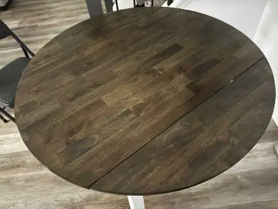 Dining Table Solid wood table, good condition, extendable., View more