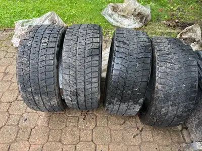 Set of 4 Bridgestone Winter tires. Size: 245/40r18 Blizzak ws80 Lots of Tread left