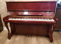 Beautiful upright piano, hardly used!