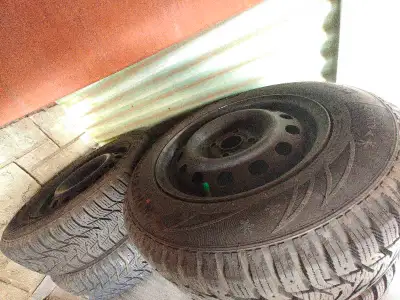 Barely used winter tires on steel rims. (Only used for half a winter).