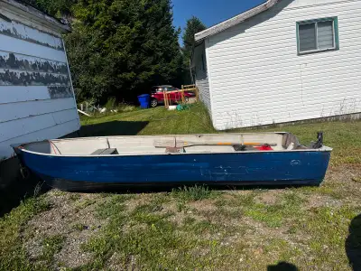 14 foot aluminum with 15 evinrude. Boat doesn’t leak a drop, and motor runs strong, goes into gear f...