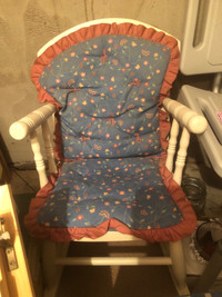 Doll rocking chair with doll