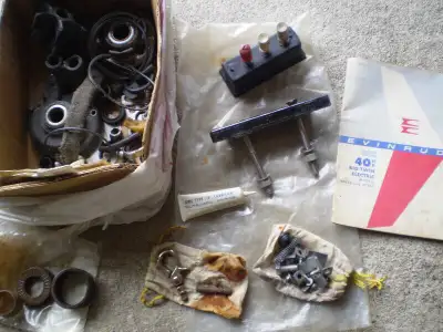 Evinrude 1963 40 HP manual and parts: switch, brackets, bearings, nuts, bolts, springs, seals, and m...