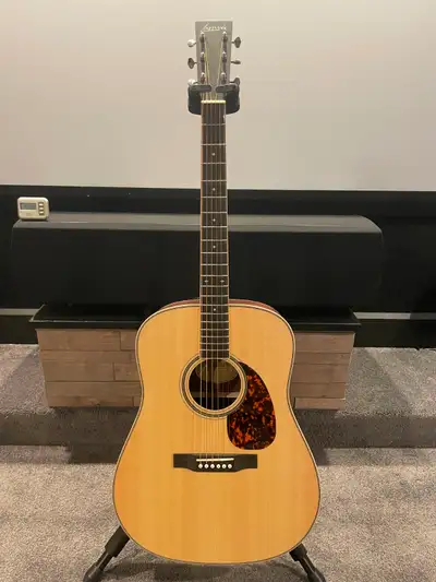 Indian Rosewood back and sides, spruce top, mahogany neck, ebony headplate, fingerboard, and bridge....