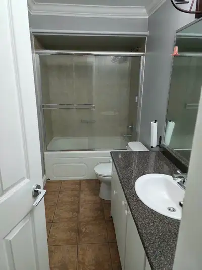 2 bedrooms basement suite for rent Good location Very clean close to surrey center and bus stop UTIL...