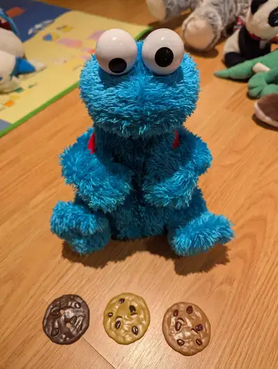 Sesame Street Cookie Monster plush pair, View more