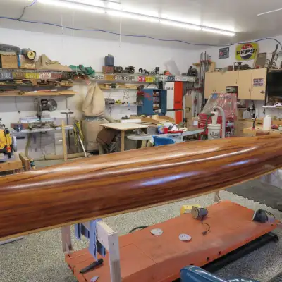 16 foot prospector, freshly refinished, comes with 2 paddles, oak gunnels and seats.