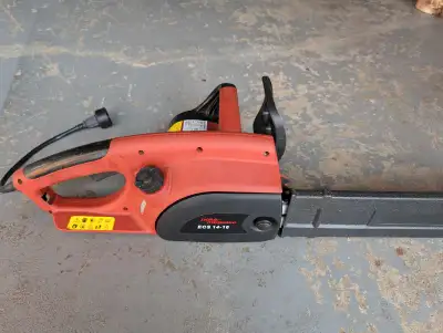 16" Electric Chainsaw in good condition, works great, chain just sharpened, comes with a cutting oil...