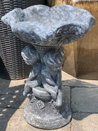 Antique concrete Cherub bird bath