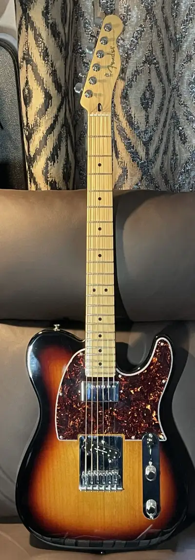 A new MIM Tele in Tri-colour burst Alder body, with Maple “C” 9.5” radius neck. Mods include pearloi...
