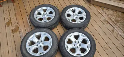 Ford2011-2013 Edge tires with rims that are in fair condition and ready to be mounted. They came off...