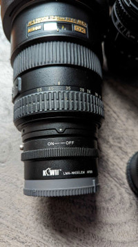 Sony NEX 6 digital camera with Nikon lens adapter and Nikon lens