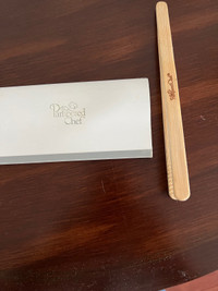 Pampered Chef kitchen scraper and bamboo tongs