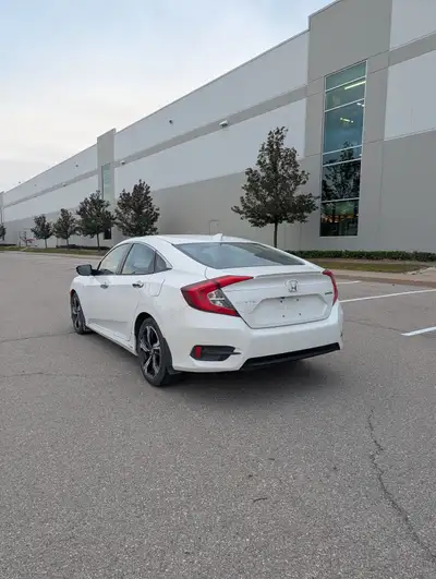 Selling my 2016 Honda Civic TOURING, Fully Loaded. Clean title in great condition. Carfax is availab...