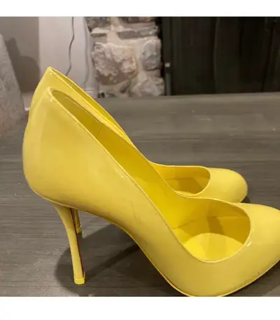Christian Louboutin Yellow Patent Pumps, View more