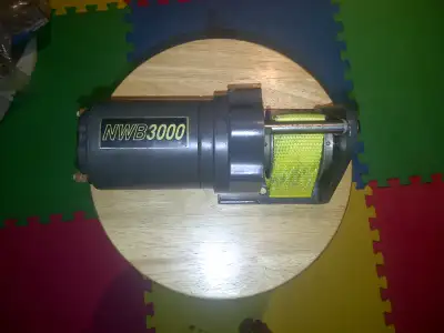 3000 lb electric snowplow winch. Originally used on a Snowbear snowplow for my truck to raise and lo...
