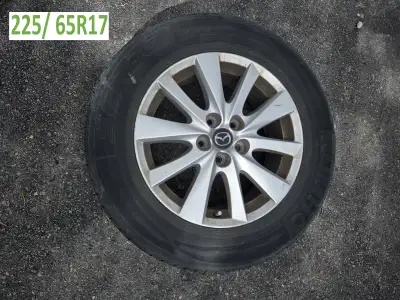 17" ALL SEASON: Good condition Kumho Sense all season tires 225/65R17 on OEM Mazda rims, DOT code 08...