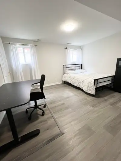 Bedroom + renovated private bathroom (ground level) Full kitchen, and laundry in the unit - shared w...