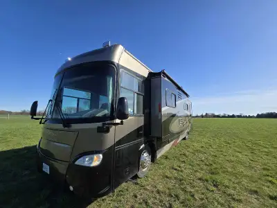 Diesel pusher 40ft long, air brakes, very low kms and hrs on the 7.5k generator also Diesel, hitch r...