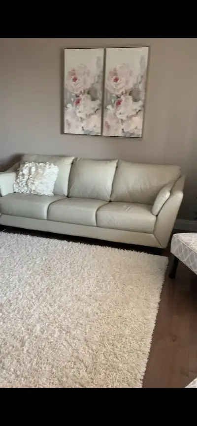 Leather couch and loveseat. Cream colour. Good condition.