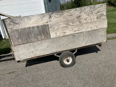 Snowmobile trailer, ideal for parts or a project. This trailer has seen better days, as the frame is...