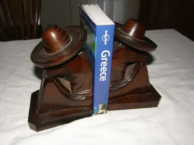 Bookend solid wood hand carved Mexican sitting with Sambero L: 8 inch W: 5 inch $50 available at 150...