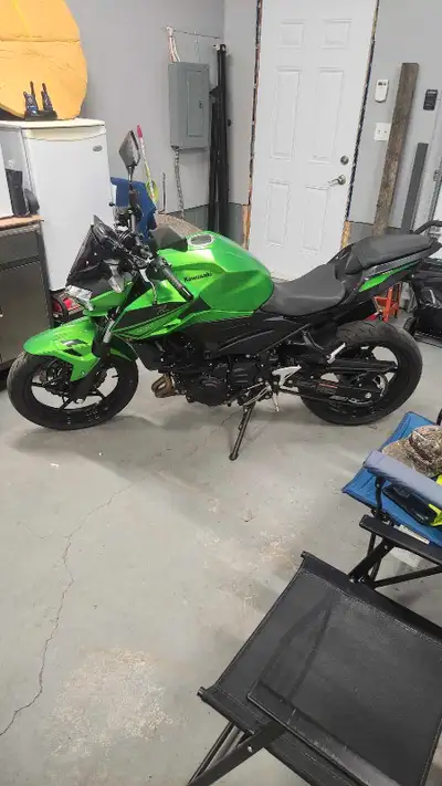 2023 Kawasaki Z400 Low mileage, only ridden 5 times. Stored in heated garage and fully stock also we...
