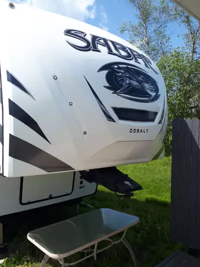 42foot 2019 Forest River Sabre out door kitchen bunkhouse with 1/2 bath big living room with theater...