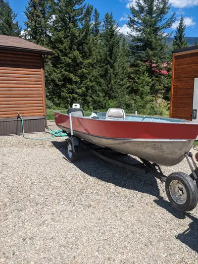1998 16ft Lund, 20hp Johnson outboard, trailer with papers excellent condition