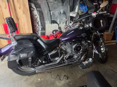2000 Yamaha vstar xvs 1100 custom. 5 speed Purple in color, lowered, after market pipes. Low mileage...