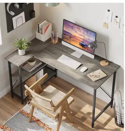 Upgrade your workspace with this stylish and functional 55-inch grey L-shaped desk, featuring revers...