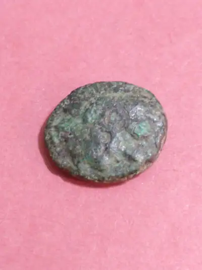 #2015-022 in GB2. Obverse, bust of Apollo facing right. Reverse, horse prancing or galloping right....