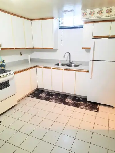 Large kitchen One bedroom and living room Separate laundry 3 piece washroom Separate entrance Near T...