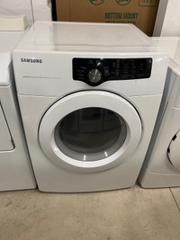 White Samsung front load electric dryer dig drum