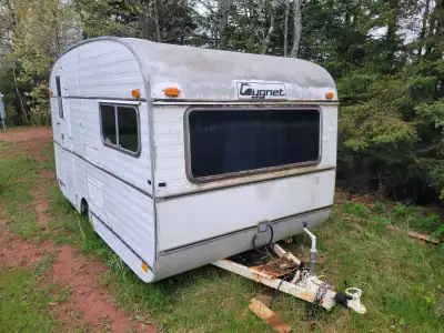 1973 Cygnet Travel Trailer Water damage to the roof at the rear . Good shape otherwise inside . Frid...