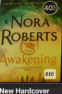THE AWAKENING by Nora Roberts, new hard cover copy, $10.Cash sa
