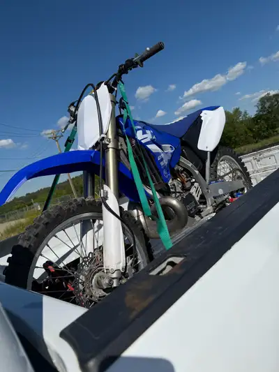 7 hours on rebuilt motor, newer rear tire, spare front tire to go with it, box of misc parts, fmf ex...