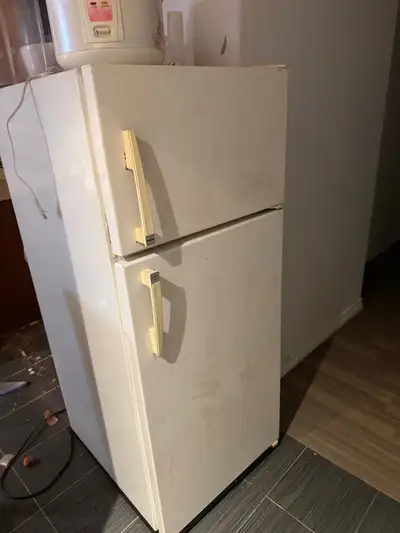 Moving sale fridge and stove $50, View more