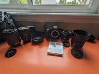 Nikon D3200 + 3 lenses + 2 batteries + strap + camera bag