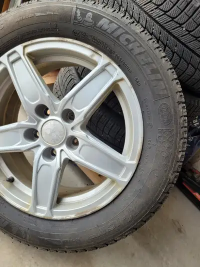 Snow Tires, Michelin X-Ice, 16" on RTX aluminum rims, with 3x TPMS (4th not installed). 7-8 mm tread...