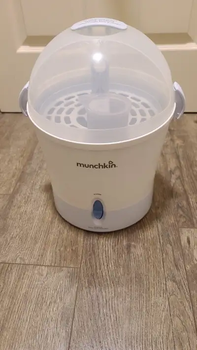 Munchkin Baby bottle sanitizer with free Avent bottle warmer, View more