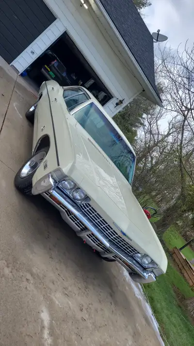 1968 Chevy impala 4 door butternut yellow four speed auto originally a 307 car now has a 350 with ms...
