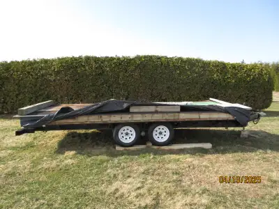 Reconditioned (as new) tandem trailer 8ft. x 18ft. 2" x 6" PT (16" centre) over steel beams. With 5/...