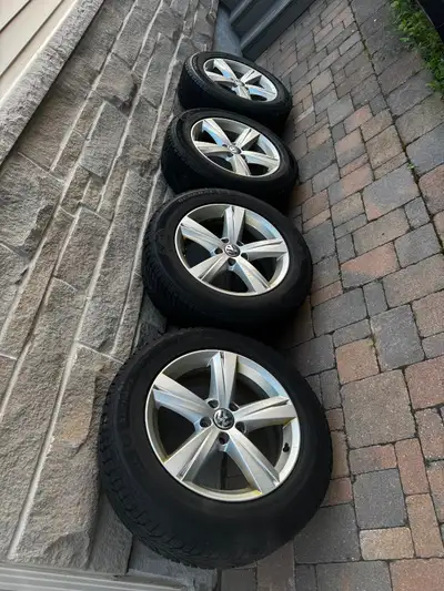 Set of General Altimax Arctic snow tires on OEM alloy rims off Volkswagen Tiguan. 80% tread left. Ve...