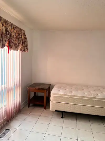 A clean, spacious bedroom is available for rent near Square One in a prime location. The room includ...