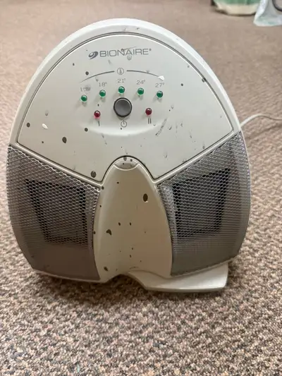 Bionaire ceramic space heater with adjustable thermostat settings (15°C–27°C) and two heat levels. ✔...