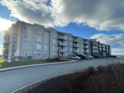 Spacious third-floor unit featuring three bedrooms, including a primary bedroom with a large walk-in...